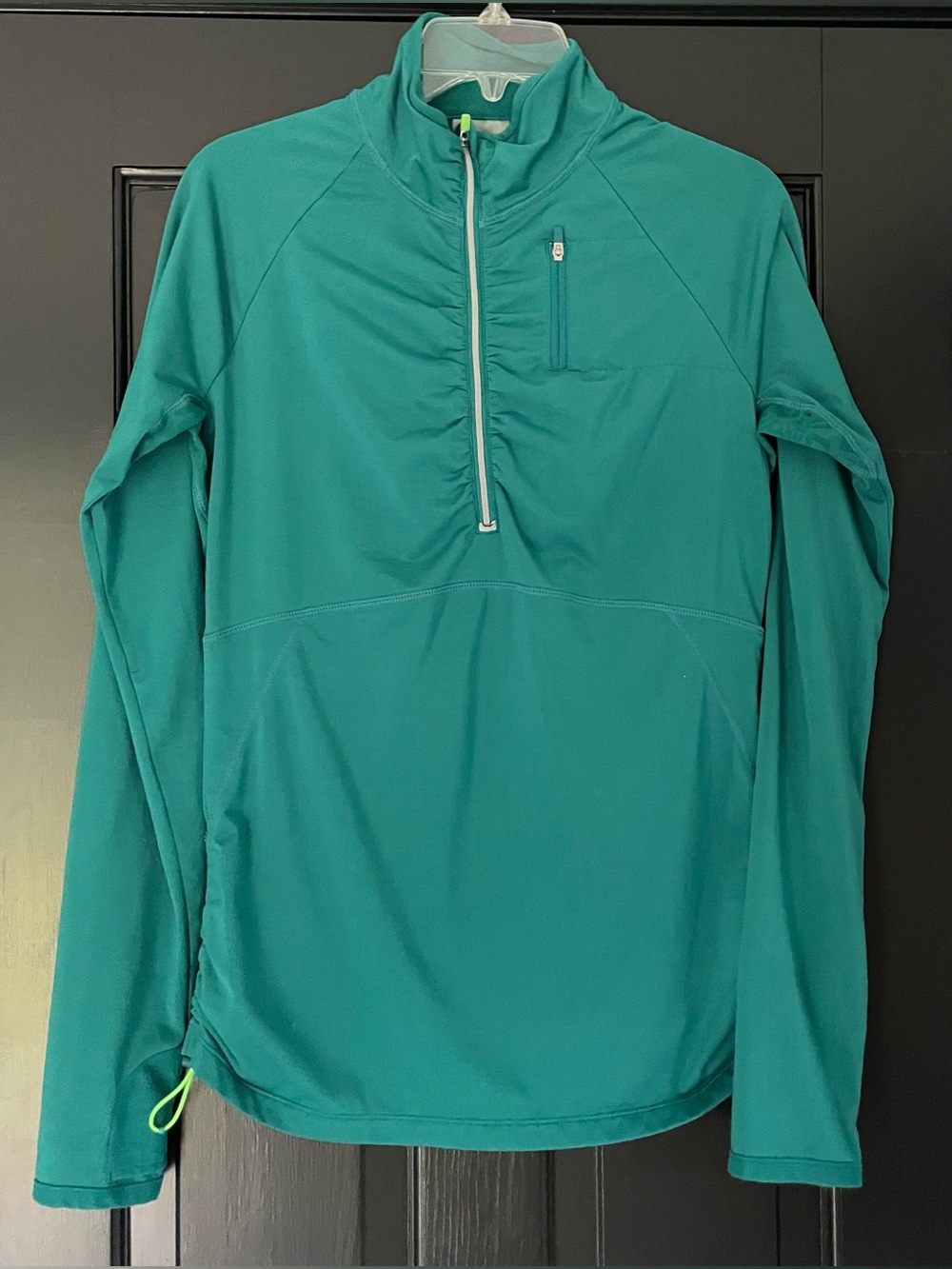 Athleta Alacrity Half Zip Pullover in a vibrant teal/green